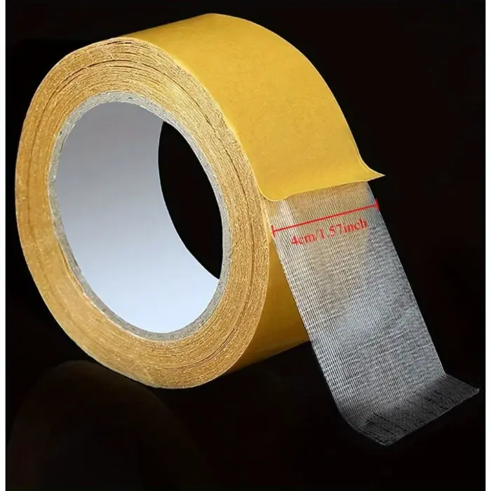 1 rouleau de ruban adhésif double face thermofusible à base de tissu