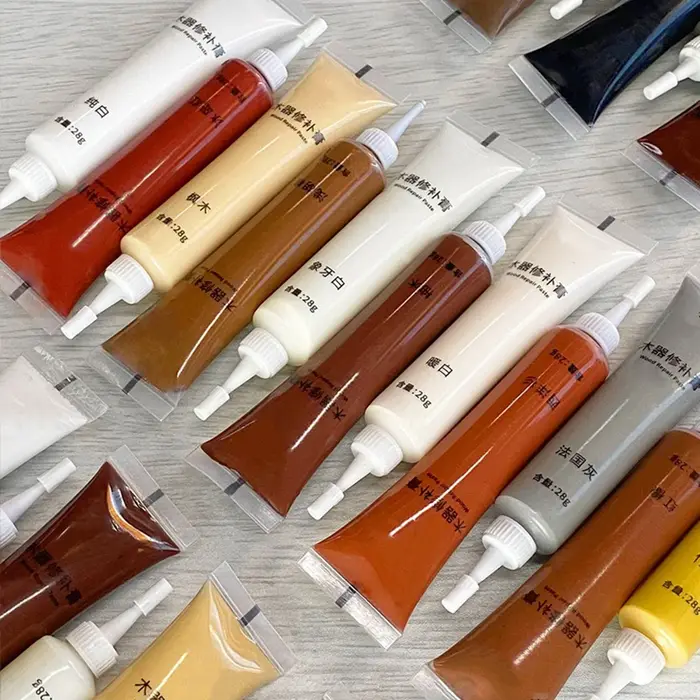 Pâte de réparation de peinture en bois