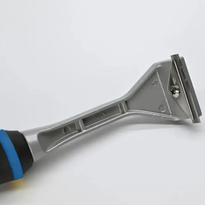 Grattoir de dissolvant de colle efficace pour l'élimination de la peinture