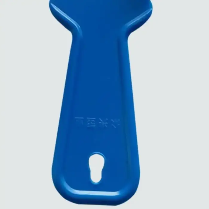 Grattoir d'angle en plastique pour cloisons sèches