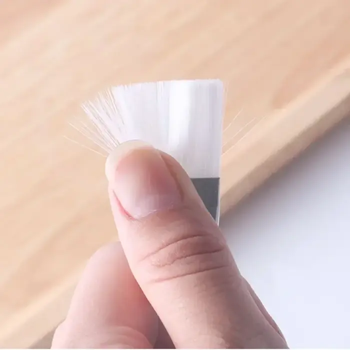 Brosse à masque à poignée transparente