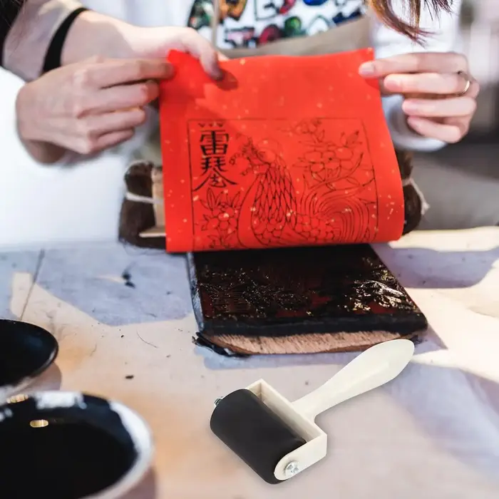 Rouleau en caoutchouc pour peinture à l'encre