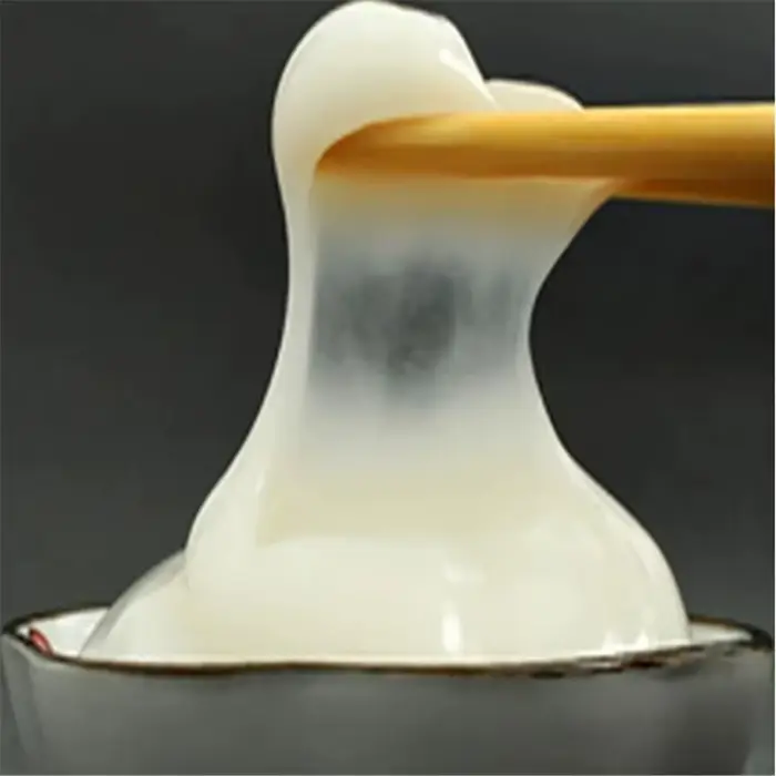 Colle de papier peint en poudre